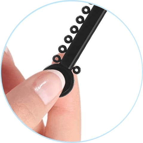 Close view of a black long-stick ligature tie