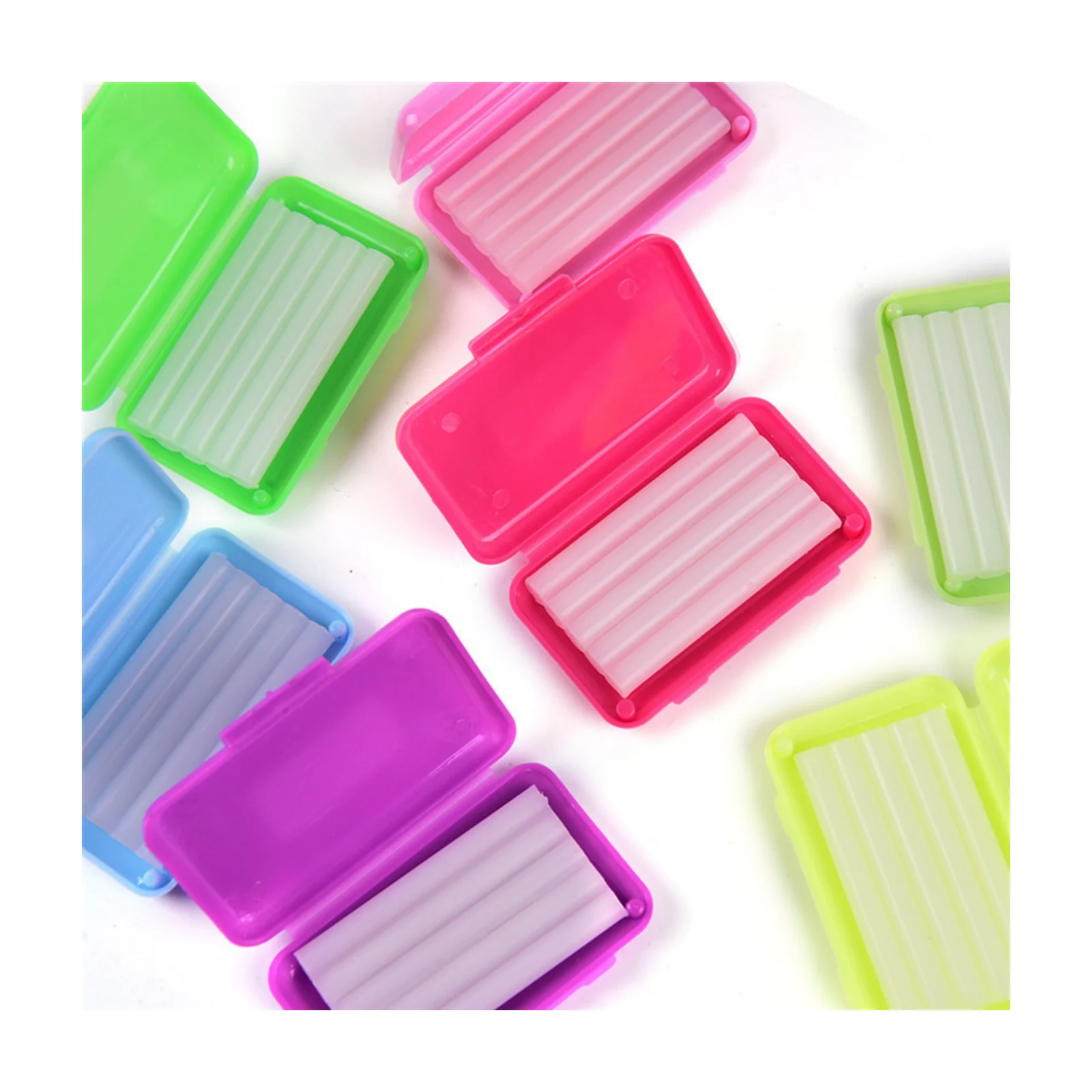 Several open orthodontic wax cases with visible wax strips