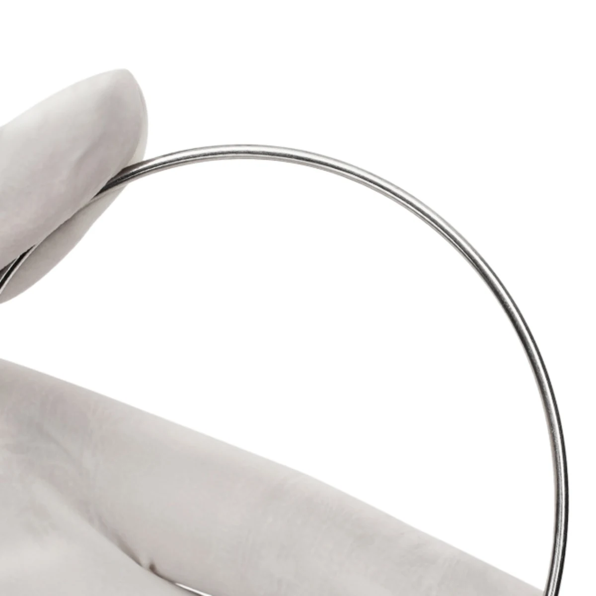 Close-up of stainless steel retainer and appliance wire being bent